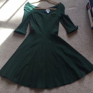 Green 50s style flare dress.